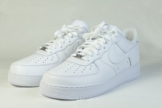 High-quality image of classic white sneakers, ideal for fashion and product design.